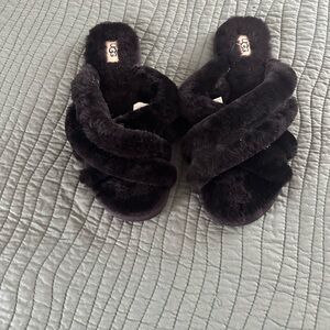 UGG Women's black criss cross slippers. Size 12